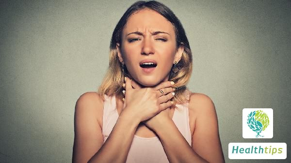 What are the common symptoms of tonsillitis?