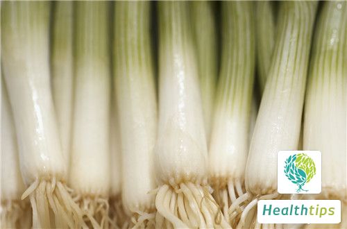 What Are the Benefits and Effects of Scallions, and Are There Any Precautions to Consider?